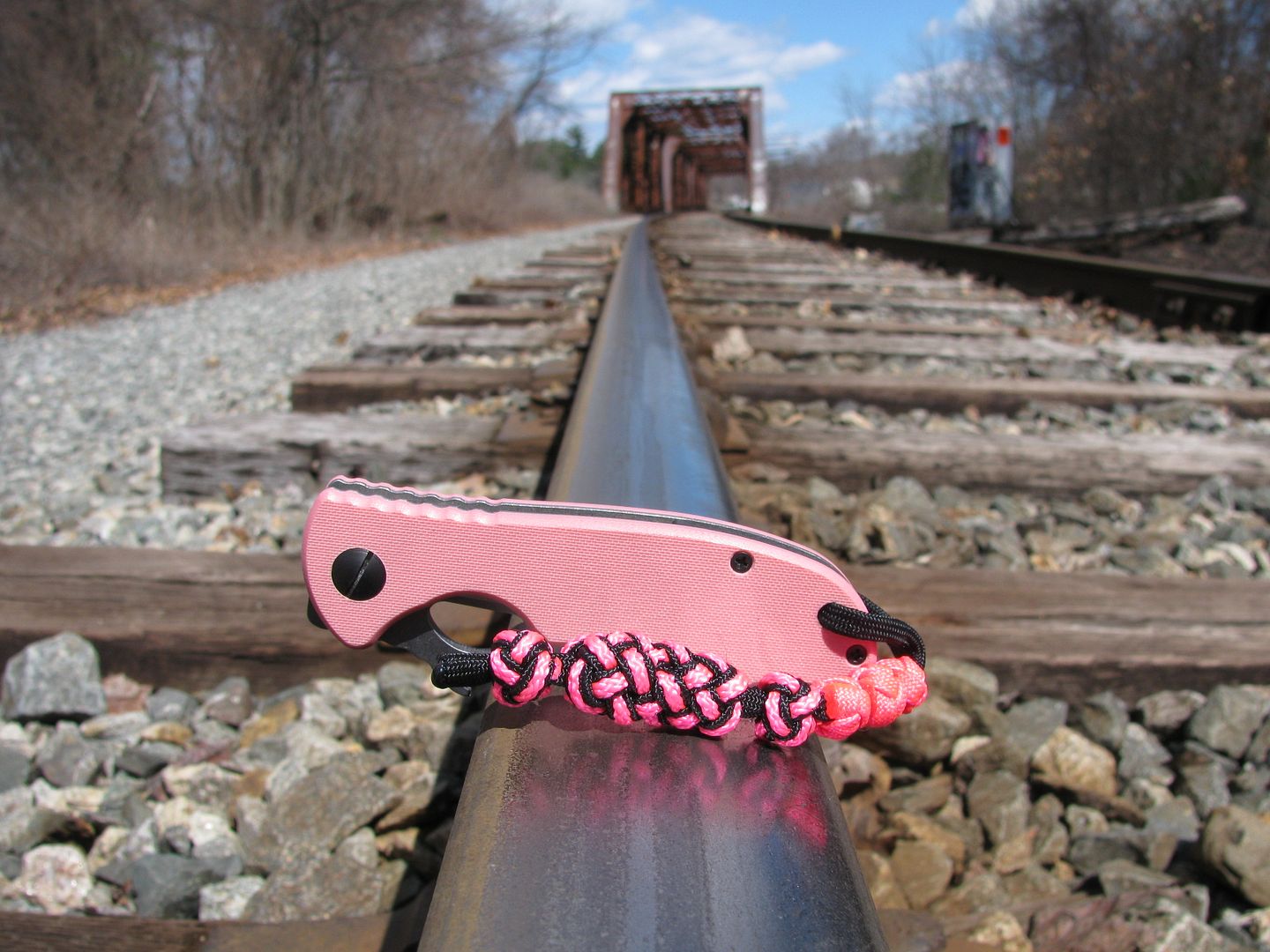 The paracord "three daughters lanyard" on a pink Emerson traveler knife Survivalist Forum